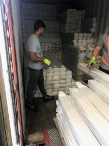 lumpers-unloading a container