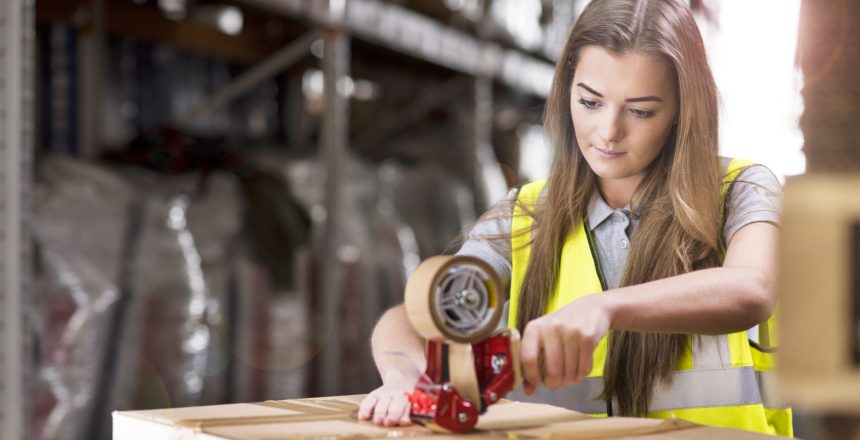 warehouse-worker-taping-box-min-scaled